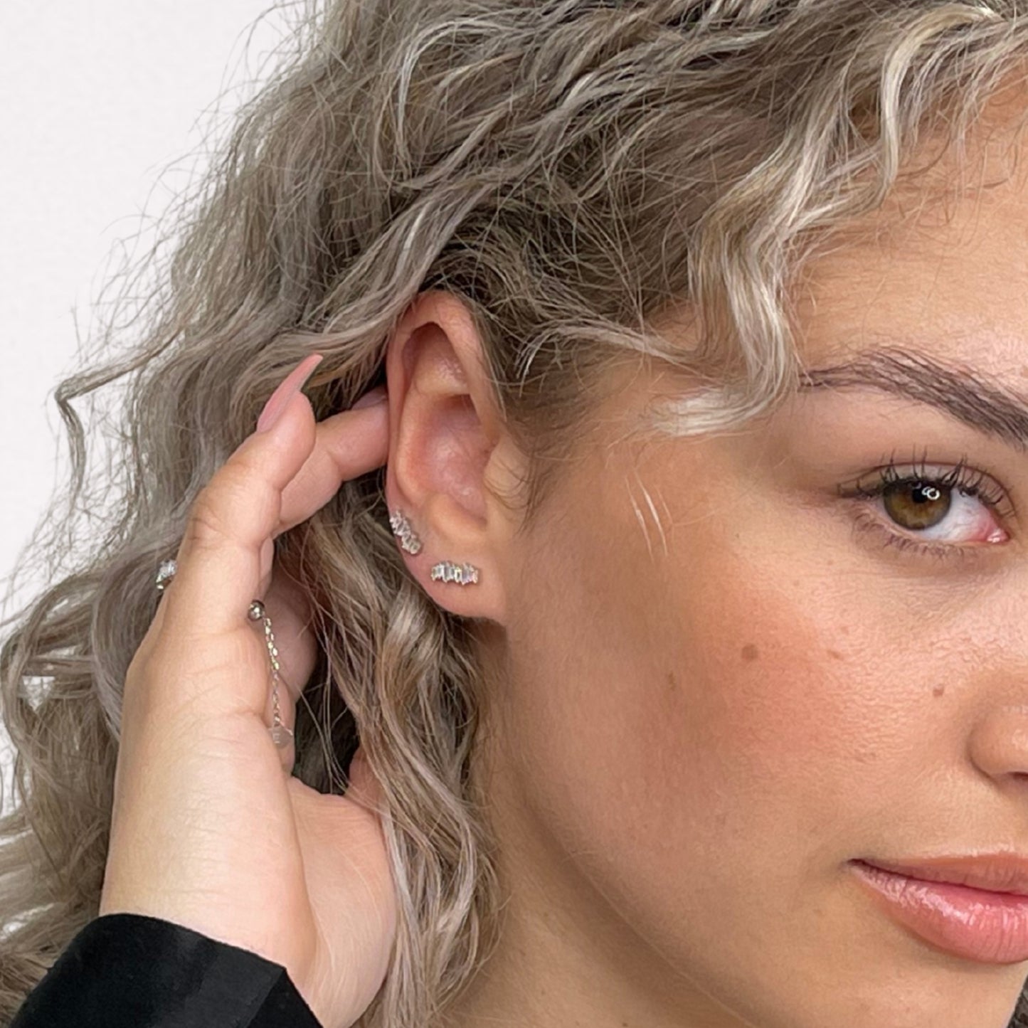 Crystal Line stud earrings in sterling silver worn by model